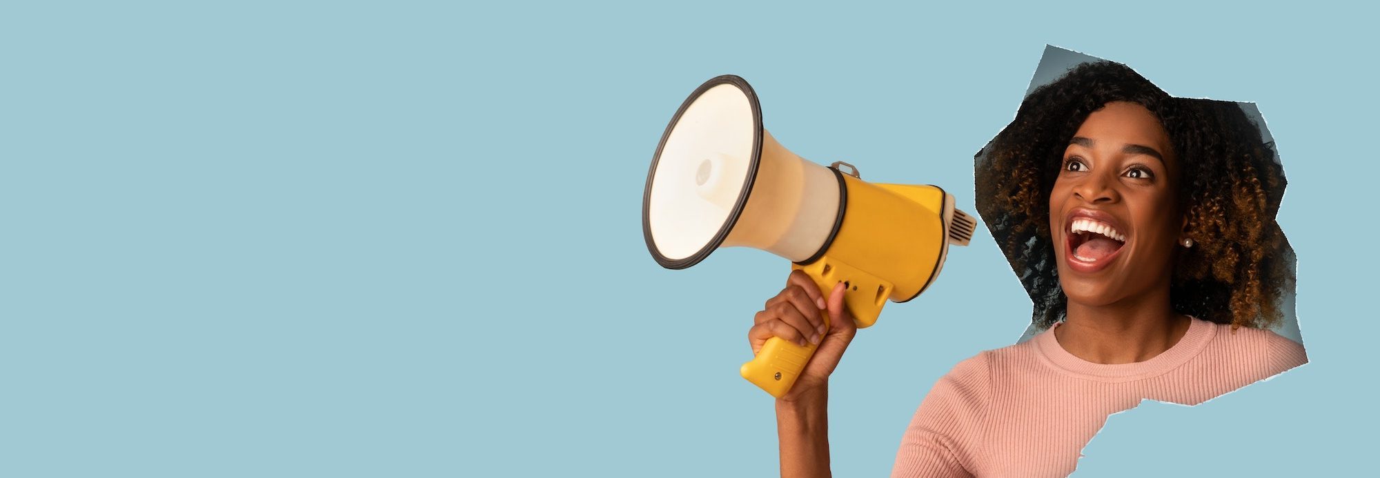 Happy excited funny millennial african american woman with open mouth, shouts in megafon